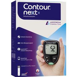 Eine Hand hält ein Blutzuckermessgerät mit der Anzeige "5.2 mmol/L".